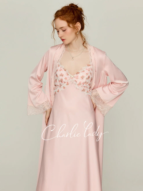 Model wearing a blush pink floral lace nightgown with matching long robe, vintage princesscore loungewear from Romantic Fairytale for dreamy cottagecore evenings.