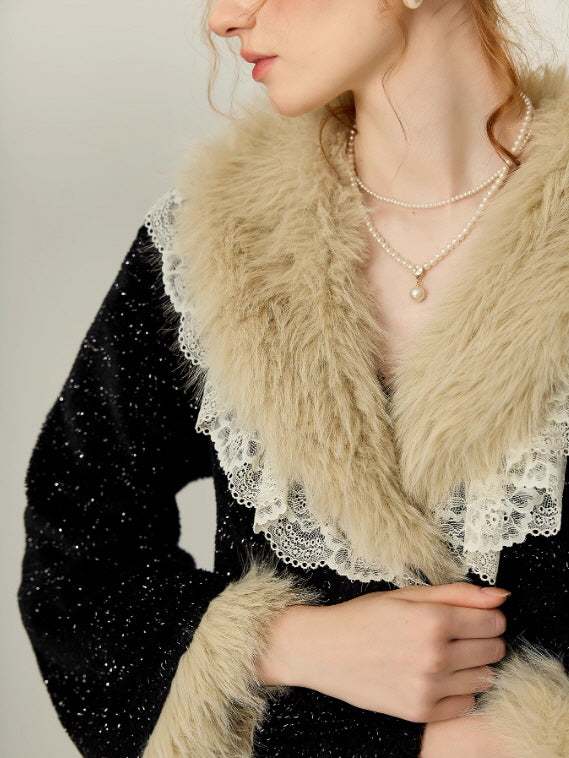 Close-up of a black robe with plush faux fur collar and lace-trim shawl detail, elegant vintage-inspired loungewear outer layer for cozy winter nights.