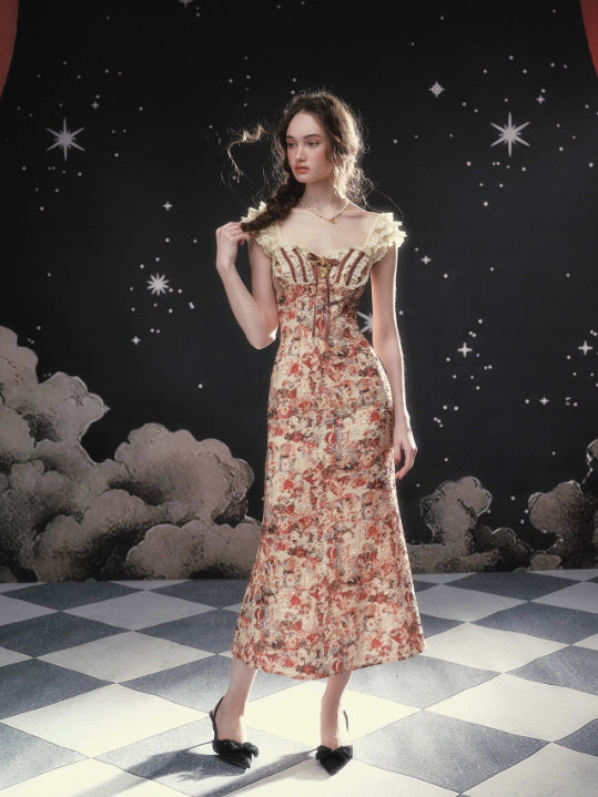Romantic vintage floral corset dress with a fitted silhouette and long skirt, creating an elegant fairycore and princesscore outfit inspired by a dark fairytale mood.
