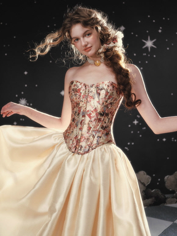 Vintage floral corset paired with a flowing ivory skirt, creating a romantic fairycore and princesscore outfit inspired by classic corsetry and fairytale elegance.