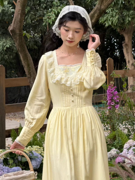 Vintage inspired pale yellow cottagecore dress with lace square neckline and long sleeves, romantic prairie style outfit