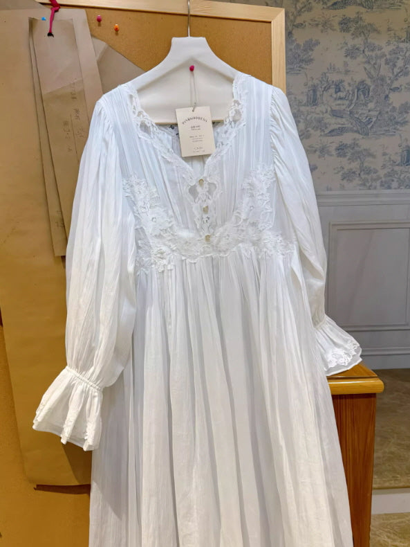 White vintage nightgown product shot with lace details and button front design, soft feminine sleepwear