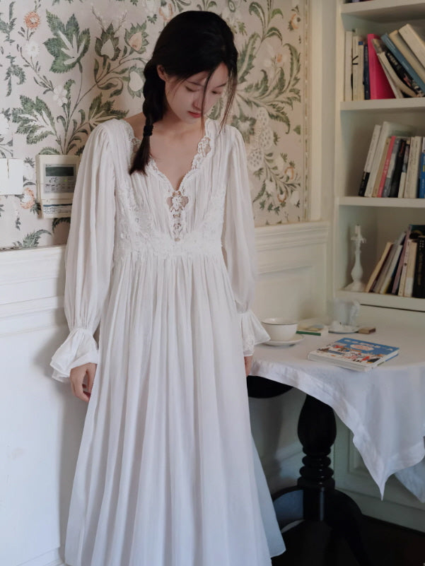 Soft white cotton nightgown with lace neckline and long sleeves, vintage romantic loungewear aesthetic