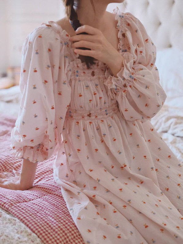 Vintage-inspired pink nightdress with delicate tiny flower print and elastic smocked waist, feminine and airy silhouette