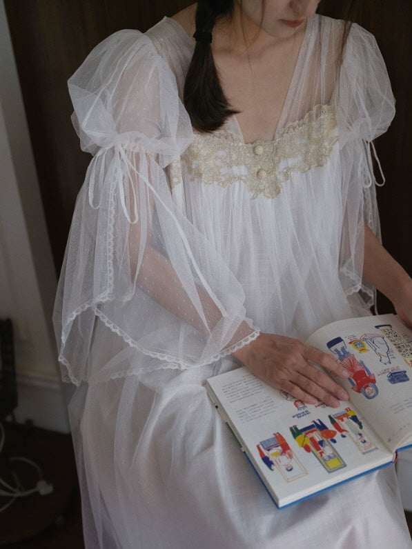 White sheer nightgown with lace bodice and airy puff sleeves, soft feminine loungewear detail