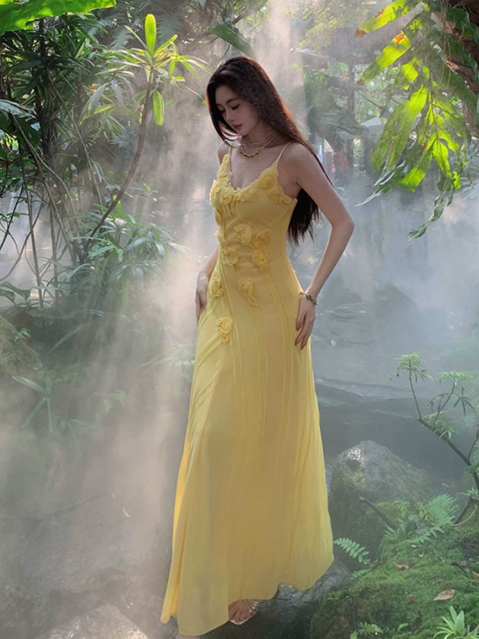 Yellow fairycore slip dress with 3D rose appliques in a misty tropical garden