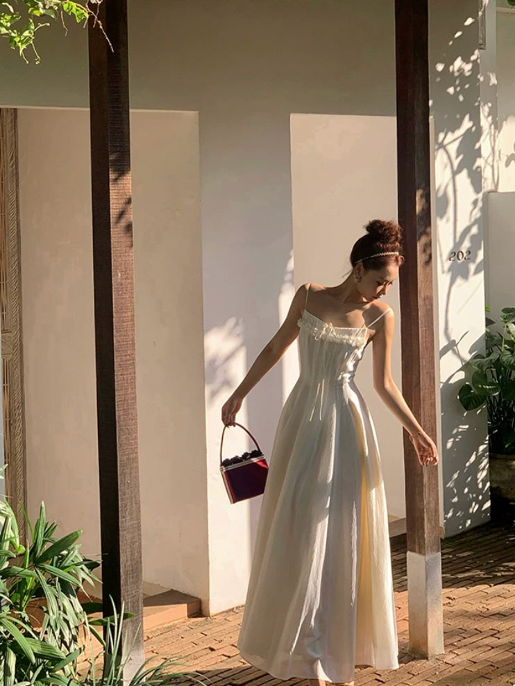 White fairycore princesscore dress with flowing skirt and romantic garden styling