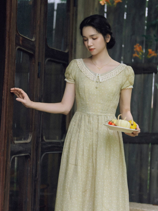 Sage green cottagecore midi dress with lace collar and puff sleeves