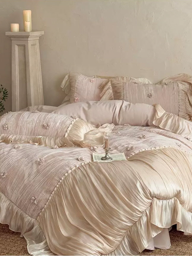 Vintage inspired pink ruffle bedding with soft ivory satin trim, floral details, and elegant cottagecore bedroom decor