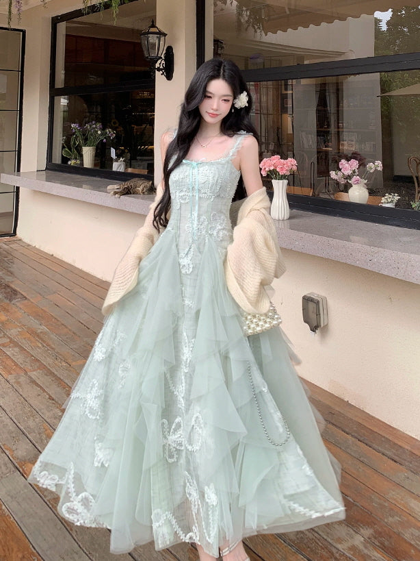Fairycore mint green long dress with white embroidered bows, lace trim and voluminous sheer tulle skirt