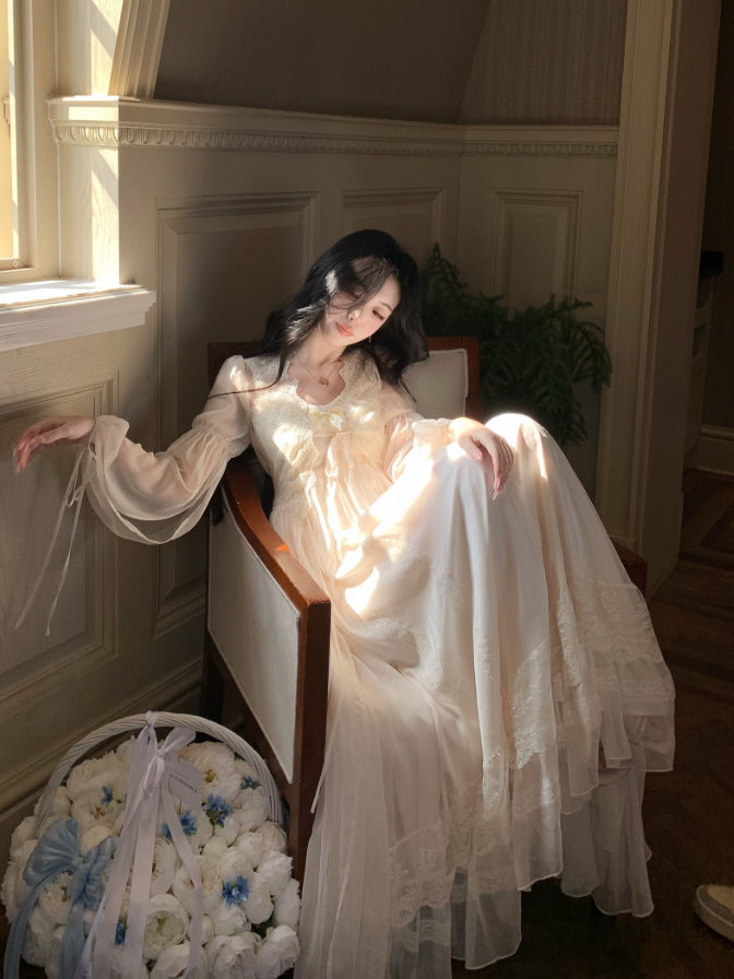 Dreamy ivory long nightgown with delicate lace trim, sheer sleeves and romantic Victorian inspired details