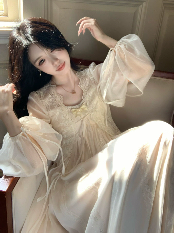 Ivory romantic nightgown with sheer puff sleeves, delicate lace trim and satin ribbon bow