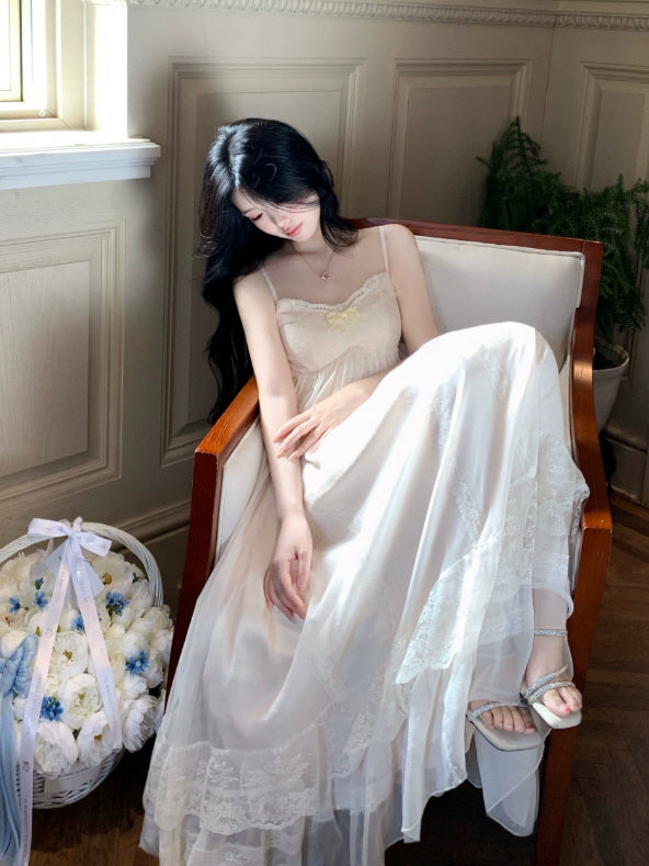 Ivory lace slip dress with spaghetti straps, soft flowing skirt and romantic vintage nightwear style
