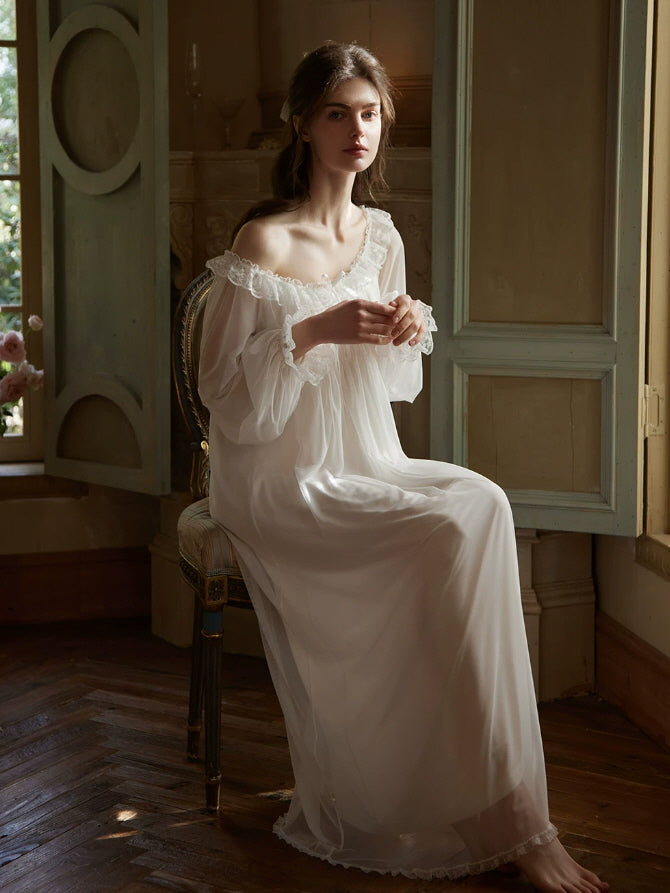 Elegant white maxi nightgown with ruffled lace neckline and sheer sleeves, vintage inspired sleepwear