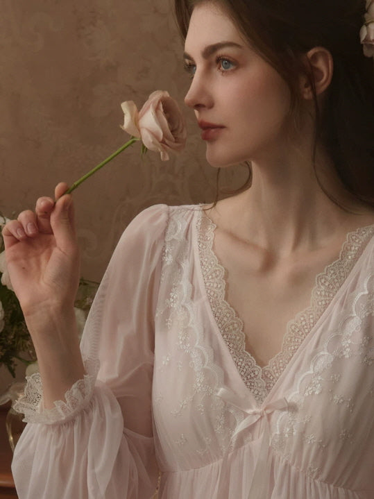 Romantic white sleepwear dress with delicate lace bodice, sheer sleeves and empire waist