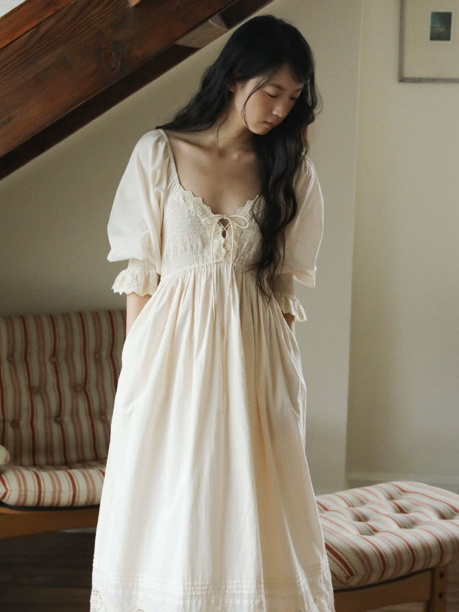 Ivory vintage nightgown with lace neckline, puff sleeves and long flowing silhouette