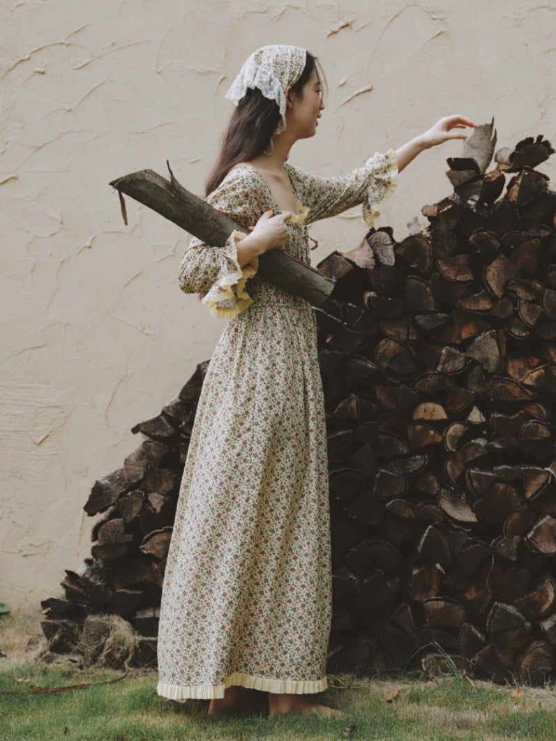 Back view of vintage inspired floral cotton nightgown with long flowing skirt and delicate ruffle hem