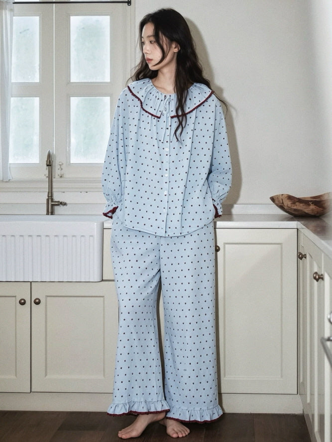 Romantic light blue cotton pajama set featuring burgundy dots, button front top and ruffled pant hems