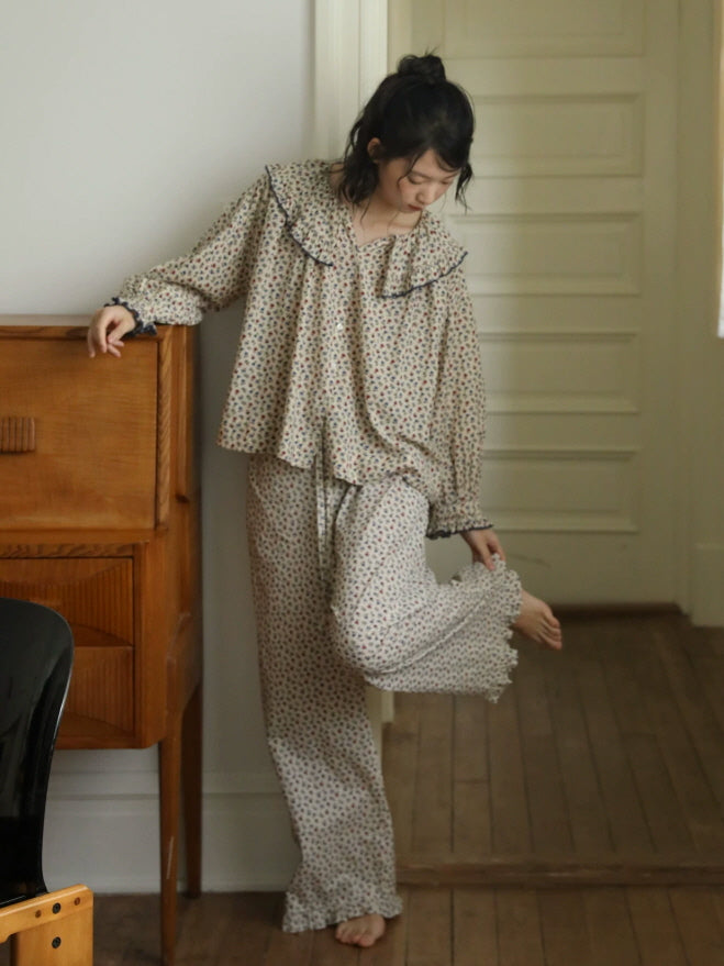 Two piece cotton pajama set with delicate floral print, relaxed blouse and soft wide leg pants