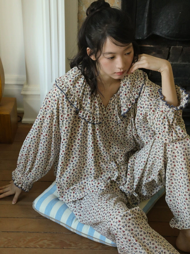 Romantic floral cotton sleepwear set with navy trimmed ruffle neckline and loose long sleeves