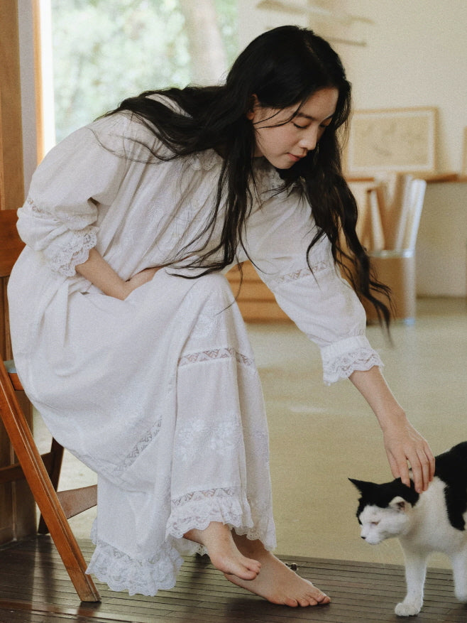Vintage inspired white cotton nightgown with embroidered lace panels and relaxed long sleeves
