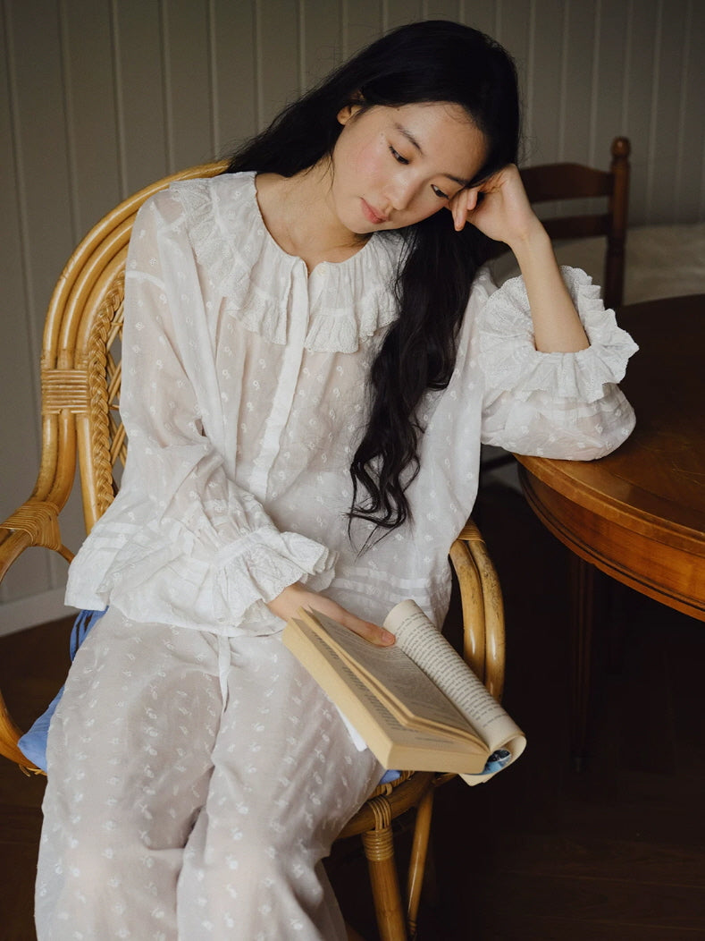 White cottagecore pajama set with floral eyelet embroidery, ruffle collar and lace trimmed cuffs