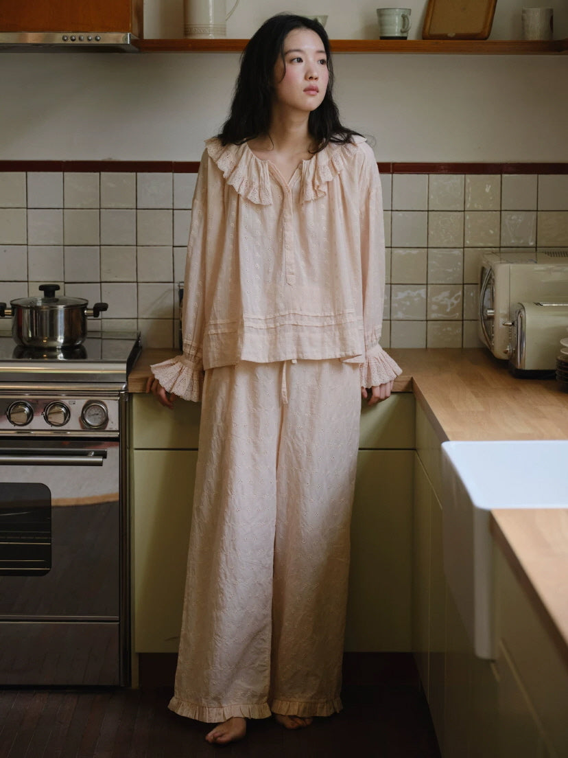 Soft pink cottagecore loungewear with long sleeves, lace trimmed cuffs and floral embroidery
