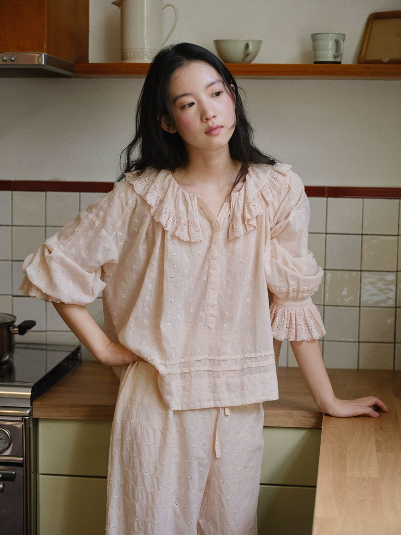 Romantic embroidered pajama set in blush pink with ruffle neckline and relaxed wide leg pants