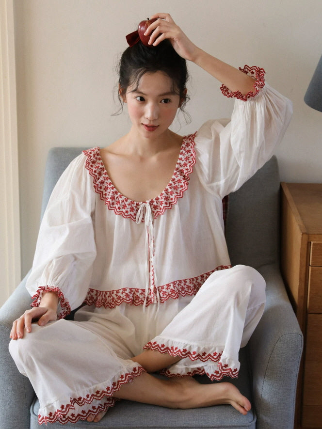 White cotton pajama set with red floral embroidery, scalloped lace trim and wide leg pants