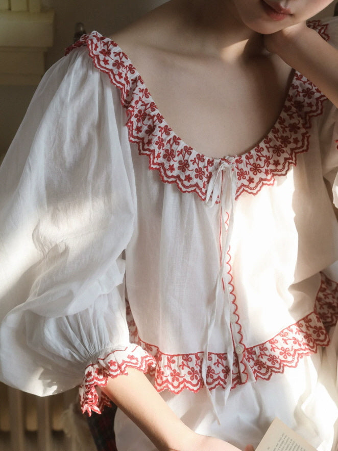 Vintage style white cotton pajamas with red floral trim, long sleeves and wide leg pants