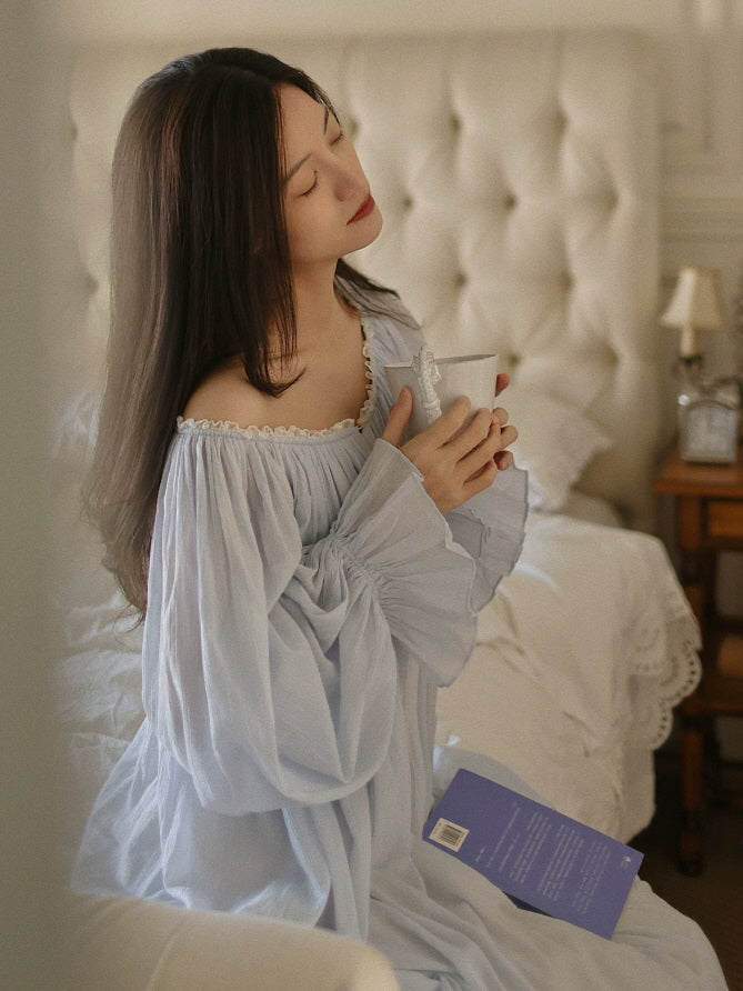 Romantic light blue nightdress with gathered neckline, delicate ruffle trim and relaxed silhouette