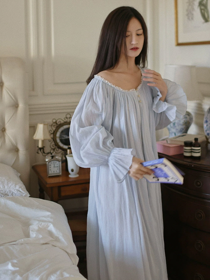 Soft blue cottagecore nightdress with gathered bodice, lace trimmed neckline and flowing fit