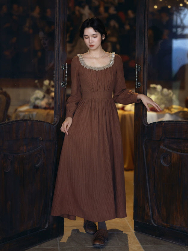 Brown vintage inspired maxi dress with square neckline, lace trim and long sleeves
