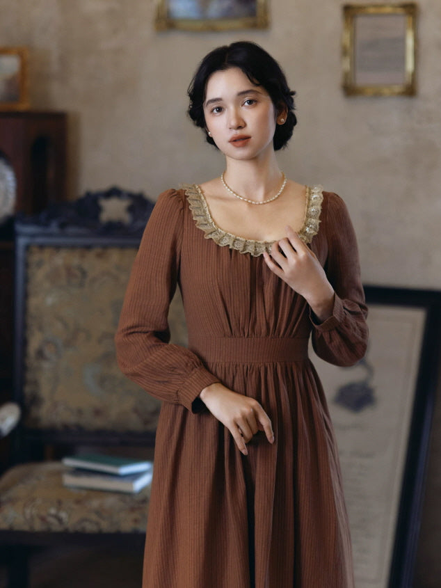 Romantic brown cottagecore dress with gathered bodice, fitted waist and lace neckline