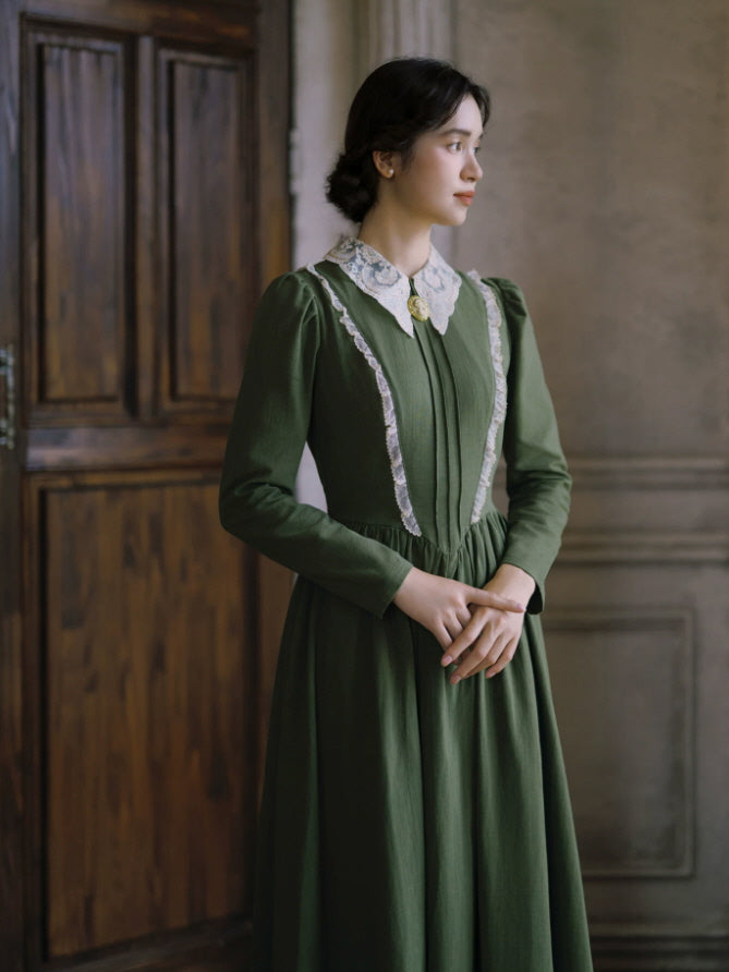 Vintage green long sleeve dress with delicate white lace collar, cameo detail and gathered waist