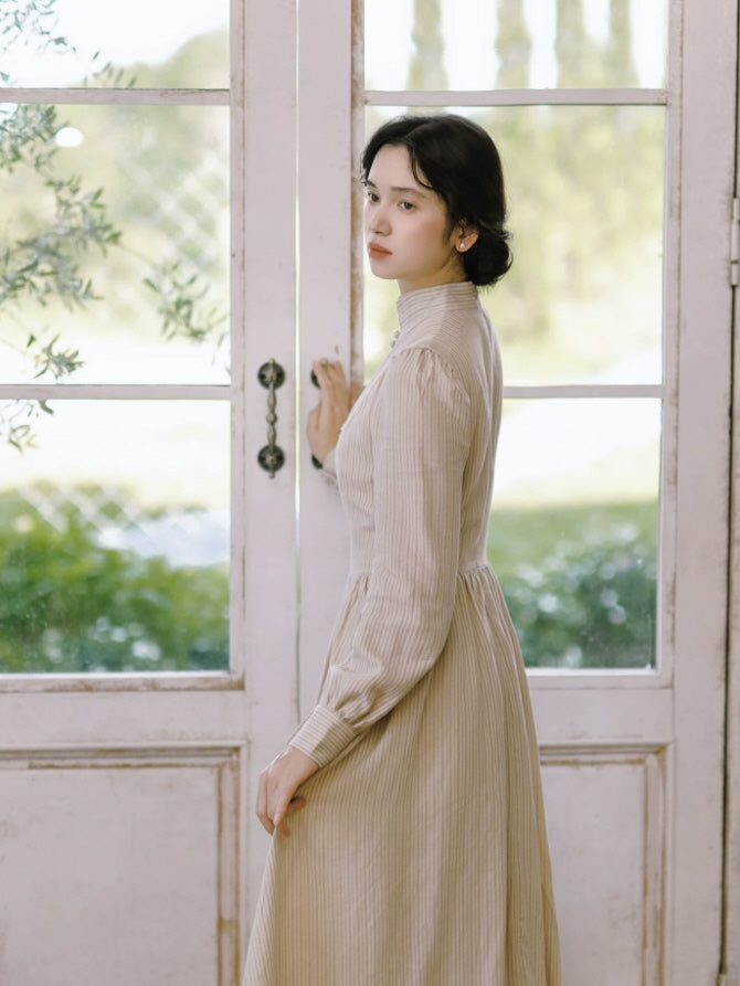 Romantic striped cottagecore maxi dress with high collar, long sleeves and softly gathered skirt