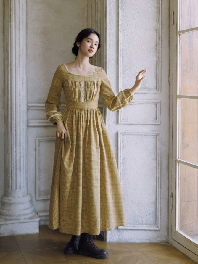 Full-length mustard gingham vintage dress with long sleeves, fitted waist and romantic cottagecore silhouette