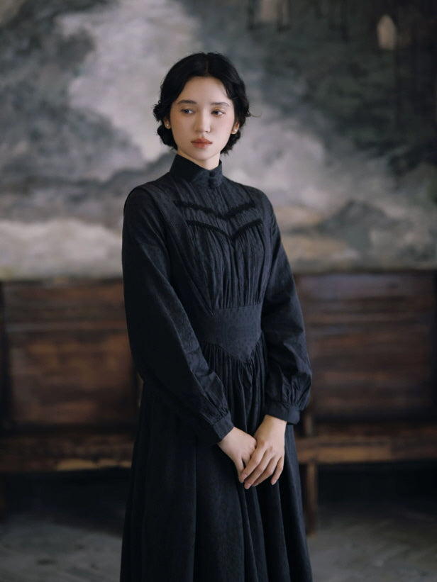Black gothic cottagecore maxi dress with long sleeves, high neck and softly gathered skirt