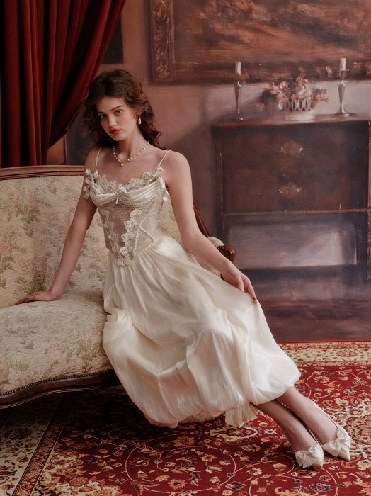 Elegant vintage-style cream balloon skirt paired with lace corset top, photographed in a classical interior with antique decor – romantic fairytale-inspired women’s outfit