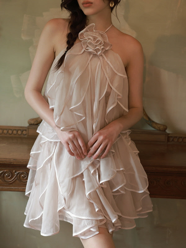 A close-up of the layered ruffle halter dress with a rose-shaped neckline, highlighting its delicate texture and romantic princesscore details.