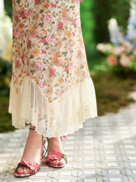 Close-up of the hemline featuring ivory lace and sheer floral fabric, highlighting romantic princesscore details and dreamy spring textures.