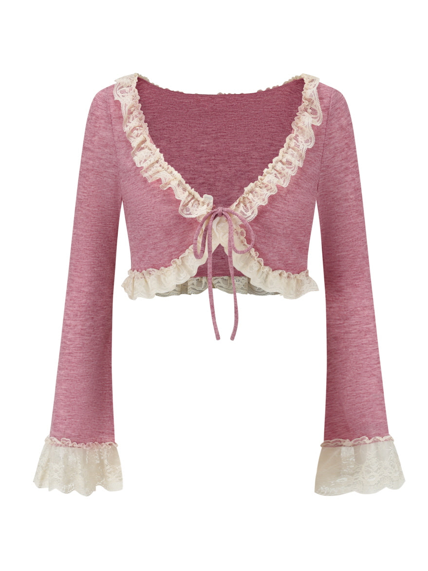 Pink cropped cardigan with lace trim and bow tie detail, featuring flared sleeves and a romantic coquette aesthetic. Perfect for layering with dresses or creating a soft, feminine look.