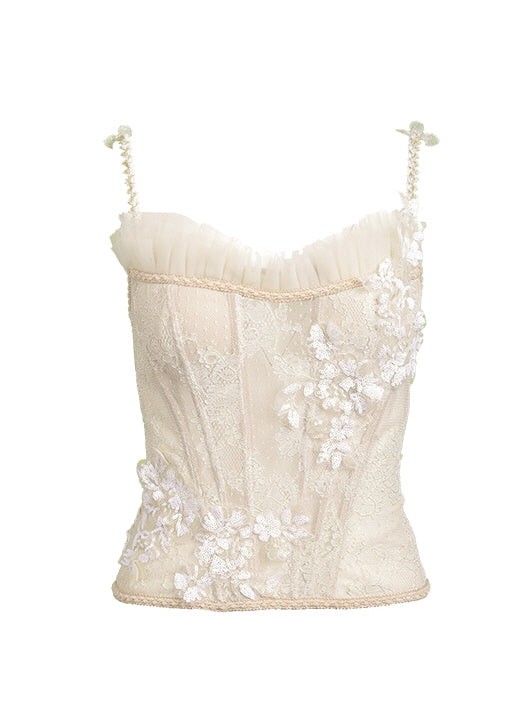 A close-up of an ivory lace corset top with floral appliqué and pleated tulle neckline, perfect for vintage-inspired fairycore and princesscore styling.