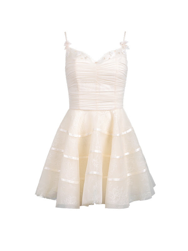 An ivory mini dress with ruched bodice, floral embroidery, and tiered lace skirt, perfect for romantic coquette and princesscore outfits.